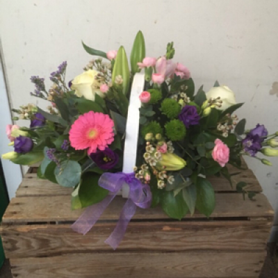 Basket arrangement  - Basket arrangement with an assortment of different flowers. No arranging needed, just place and enjoy! 