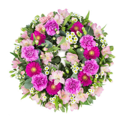 Wreath SYM-320 - Classic Wreath in Shades of Pink. A classic and beautiful arrangement to send for a funeral. Approx size: 36cm / 14” Oasis Wreath Frame.