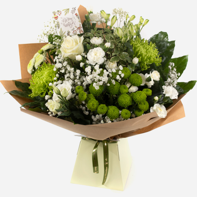 Joy to the World - This dreamy white and green hand-tied Christmas design evokes the spirit of the season in flowers. The perfect way to share joy this festive season.
