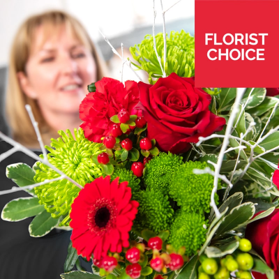 Christmas Florist Choice Gift Wrap - Let the experts create a unique bouquet using the freshest festive beautiful blooms of the day, made especially for your loved one.