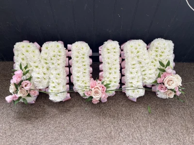 MUM - Mum letters, with white chrysanthemum, pink ribbon edge, and corsage sprays on the letters