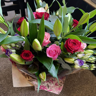 Grace & Beauty - A beautifully arranged aqua bouquet featuring elegant seasonal blooms, ready to enjoy and perfect for marking any special occasion.