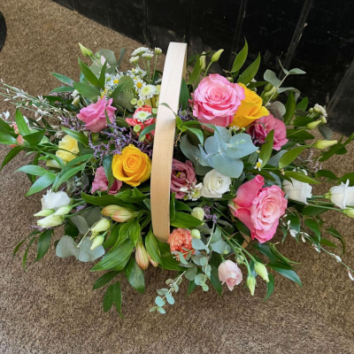 Rustic Rose Basket - A beautifully arranged floral basket filled with fresh seasonal blooms, thoughtfully designed to brighten any occasion with natural charm.