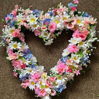 Pastel Garden Heart - A beautifully crafted open heart tribute in soft pastel shades, thoughtfully designed to express love, remembrance and treasured memories.