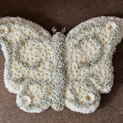 Eternal Butterfly Tribute - A beautifully handcrafted butterfly tribute in elegant white tones, symbolising peace, hope and the everlasting memory of a loved one.