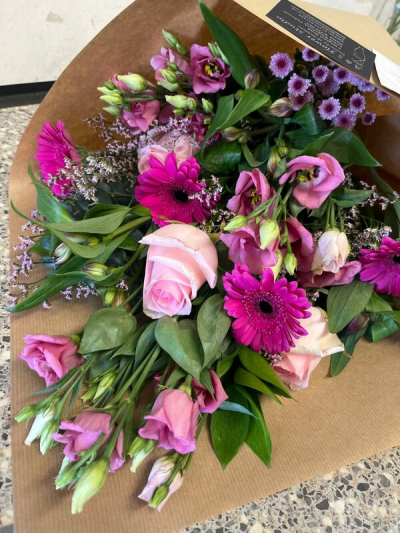 Perfect in Pink - A vibrant hand-tied design bursting with rich pink shades and cheerful seasonal style.