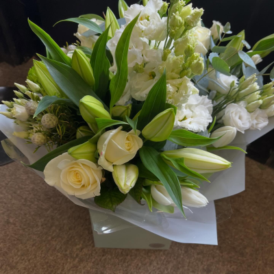 Pure Grace - A sophisticated all-white bouquet, carefully arranged to create a timeless and elegant gift.