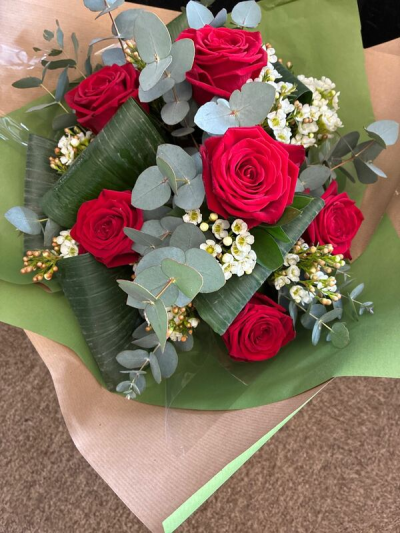6 Red Roses - A classic hand-tied bouquet of 6 rich, romantic roses, beautifully arranged to make any occasion feel extra special.