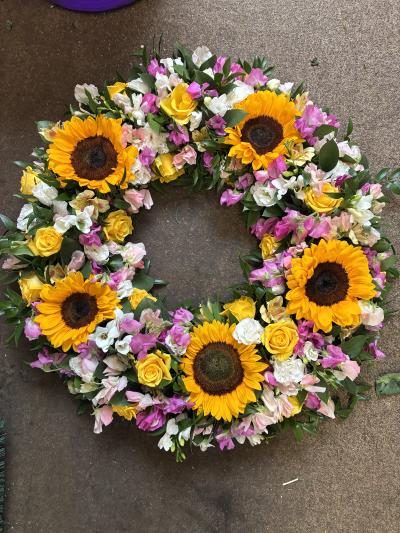 Wreath 002 - Yellow sunflowers with a mixture of seasonal flowers in pinks and whites