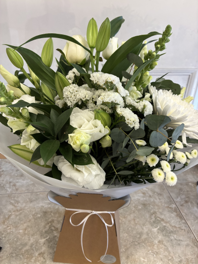 Classic whites and greens - A classic whites and greens stylish arrangement arranged in water